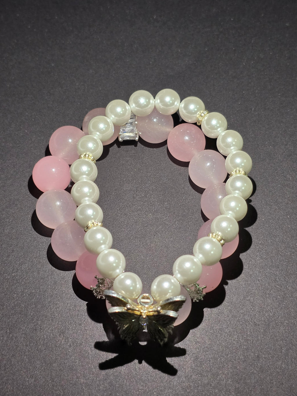 Pink crystal and pearl double-ring bracelet