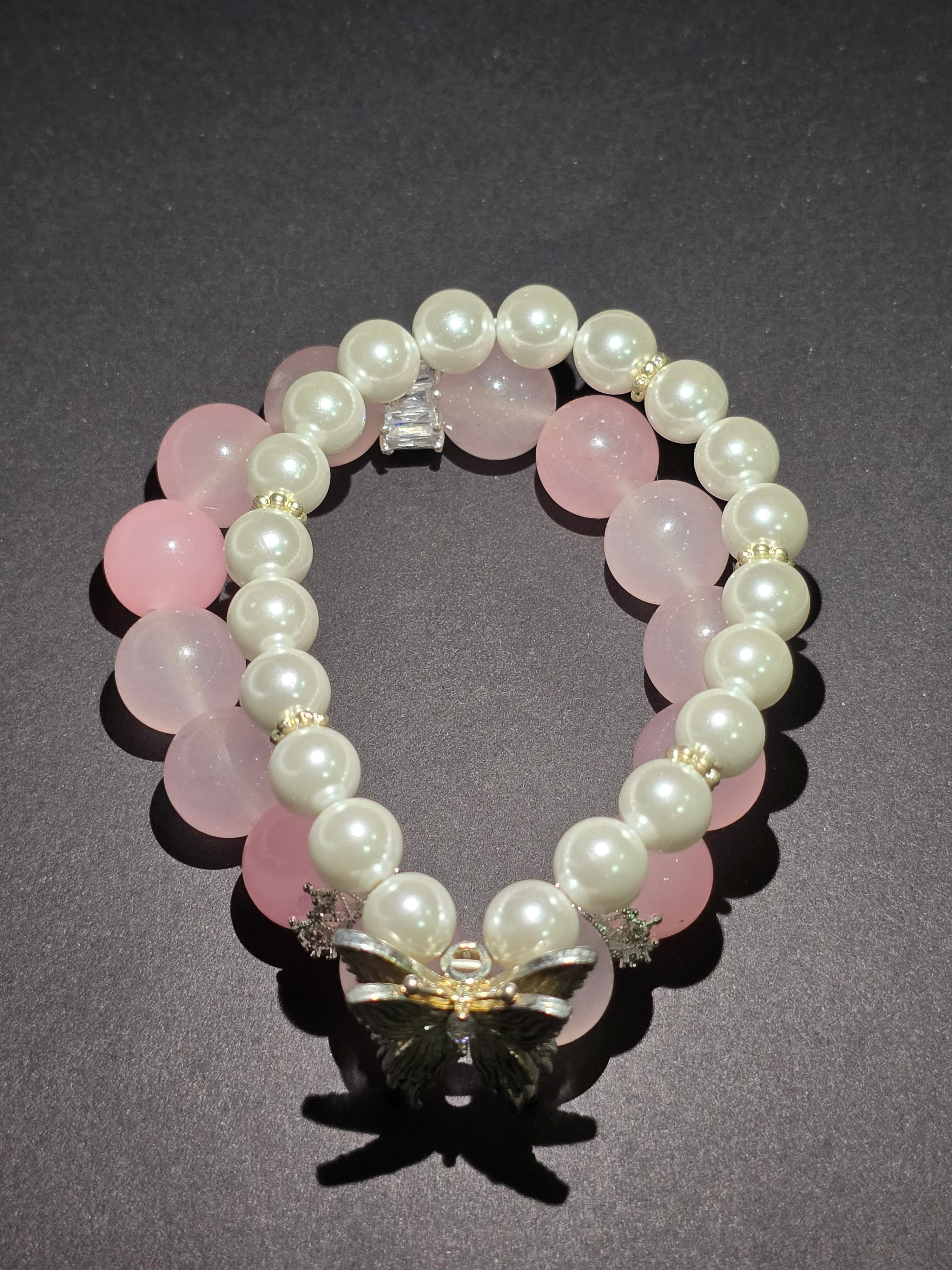 Pink crystal and pearl double-ring bracelet