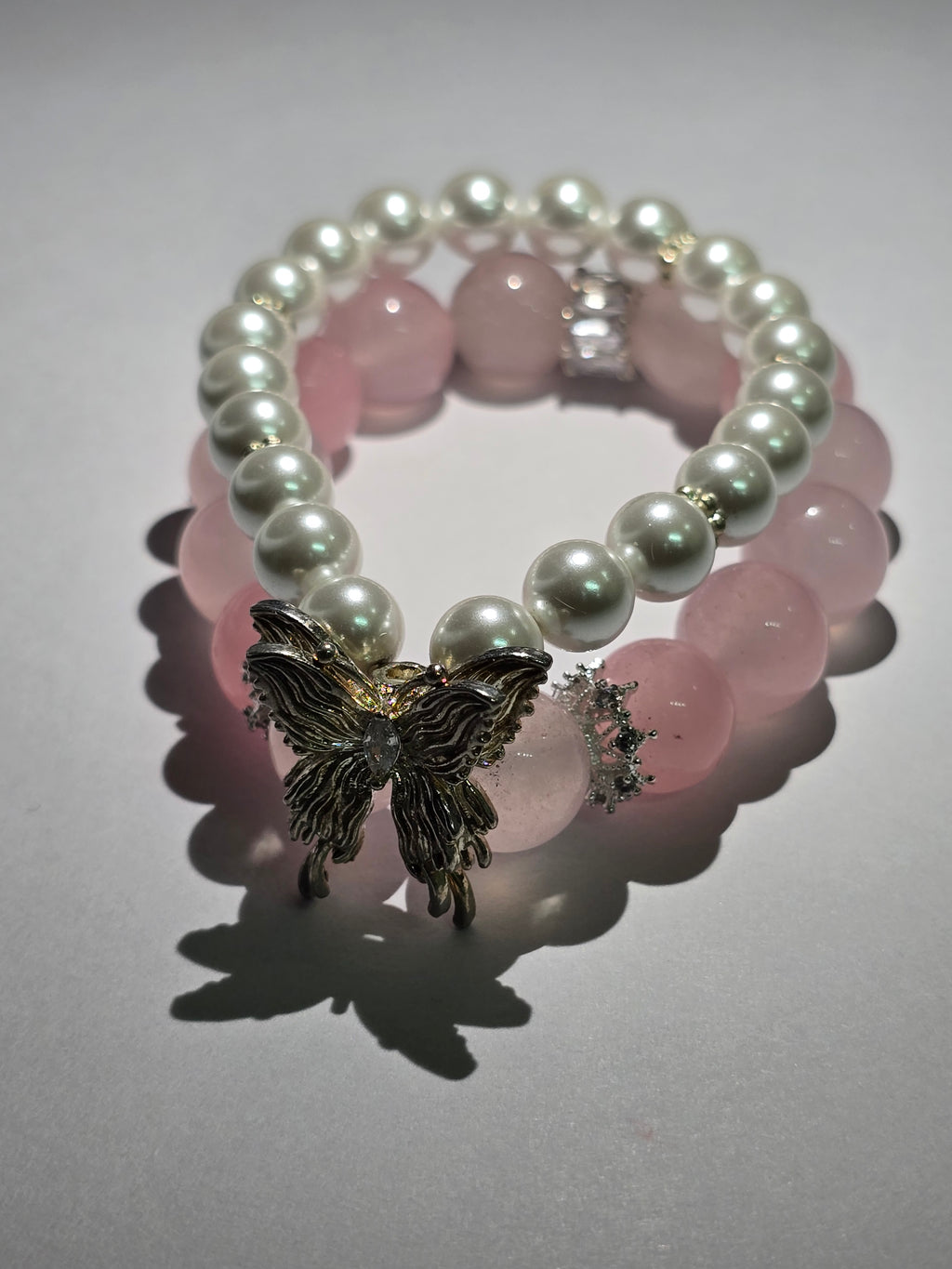 Pink crystal and pearl double-ring bracelet