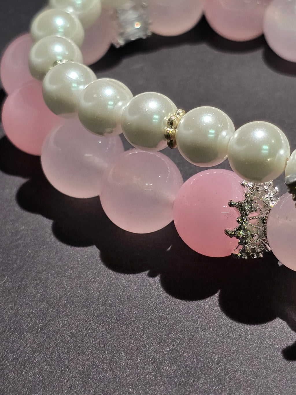 Pink crystal and pearl double-ring bracelet